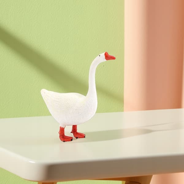 2 COLLECTOR’S ITEMS: MINI PLASTIC DECORATIVE GEESE