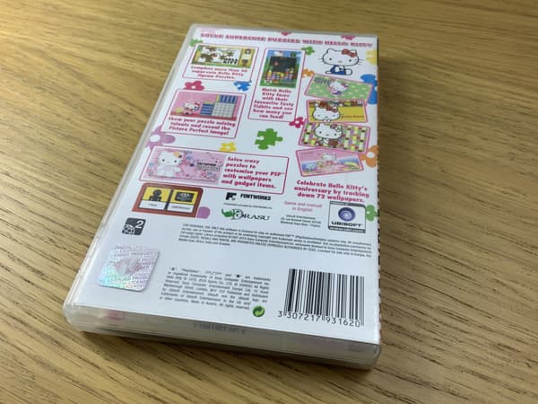 HELLO KITTY PUZZLE PARTY CD – very good+ condition, complete PSP set