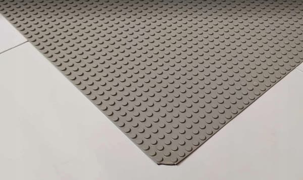 109x1aa. LEGO 4186 thin 48x48 tile, thin grey – DAMAGED