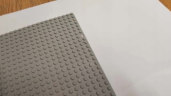 109x1d. LEGO 4186 thin 48x48 grey plate (old US) – DAMAGED