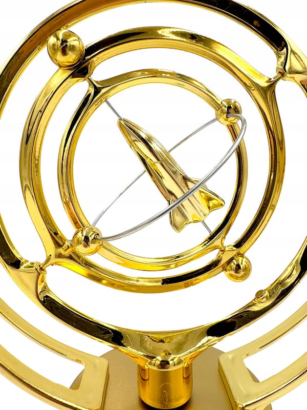 Battery-powered perpetual motion machine with a rocket – golden space rocket – space ornament