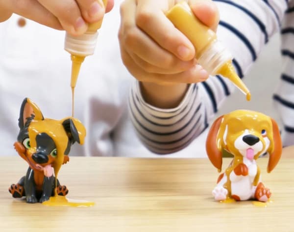 Brudaski collectable figurines: a white and brown Beagle in the bath