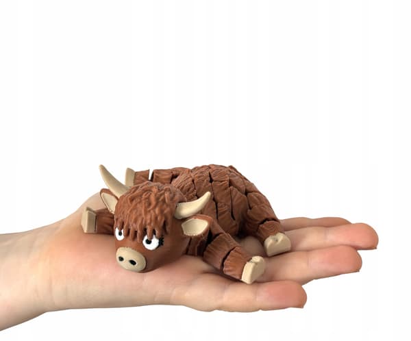 Cute segmented Fudge, 3D Mountain Cow – a charming, movable figurine