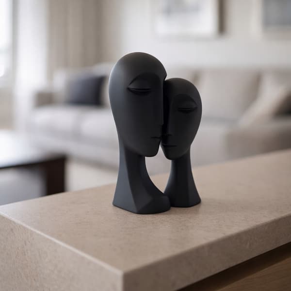 DECORATIVE ABSTRACT FIGURINE FEATURING A PAIR OF FACES ON A BASE – MANY COLOURS