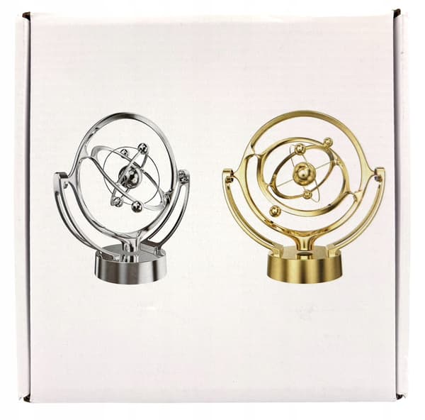 Battery-powered perpetual motion machine with a rocket – decorative silver rocket, space-themed ornament