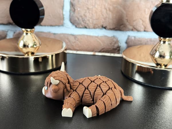 Cute segmented Fudge, 3D Mountain Cow – a charming, movable figurine