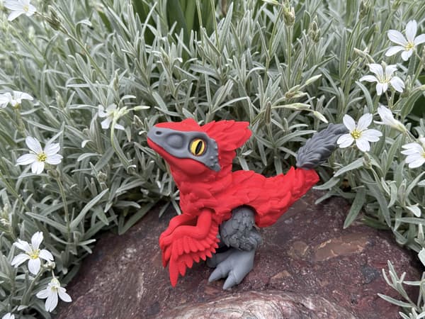 Pyroraptor dinosaur 3D moving figurine inspired by the feathered predator