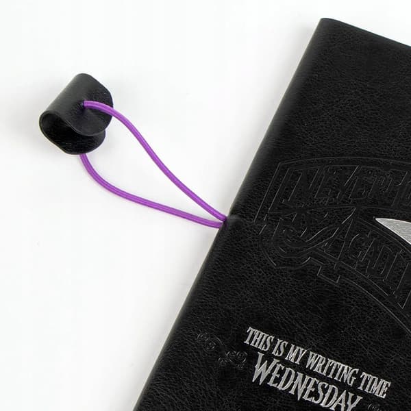 Black notebook with an elastic band, Wednesday