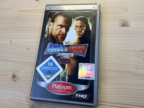 SMACKDOWN VS RAW 2009 WWE disc – very good+ condition, complete PSP set