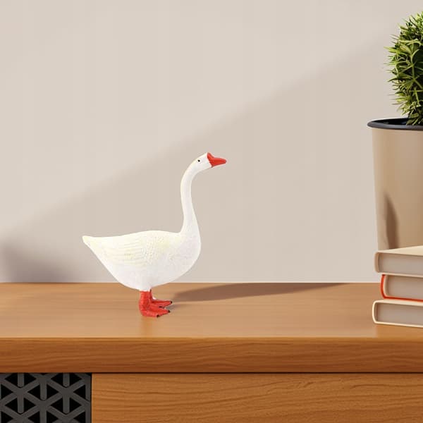 2 COLLECTOR’S ITEMS: MINI PLASTIC DECORATIVE GEESE