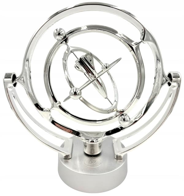 Battery-powered perpetual motion machine with a rocket – decorative silver rocket, space-themed ornament