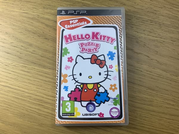 HELLO KITTY PUZZLE PARTY CD – very good+ condition, complete PSP set