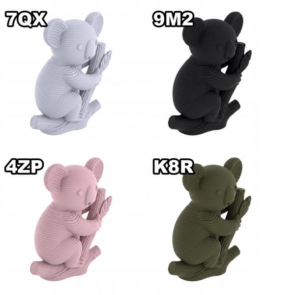 KOALA FIGURINE ON A TREE TRUNK – A CHARMING TABLE DECORATION IN A WIDE RANGE OF COLOURS