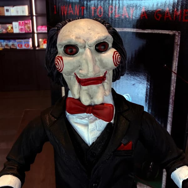 A 12-inch Billy the Dollmaker figurine with a tricycle, Display
