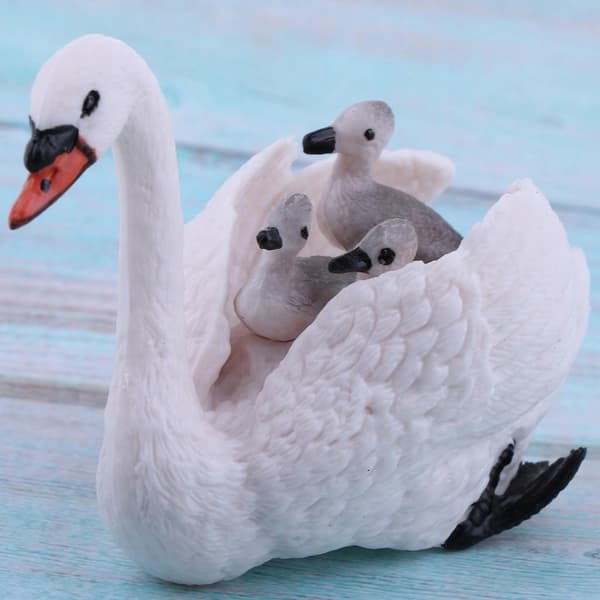Realistic white swan with baby figurines; Animal figurines; Easter eggs; Cake