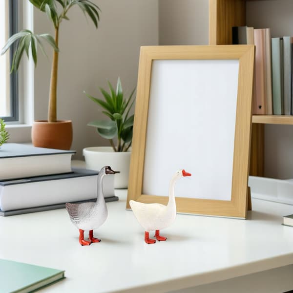 2 DECORATIVE GOOSE FIGURINES FOR YOUR DESK AND PATIO