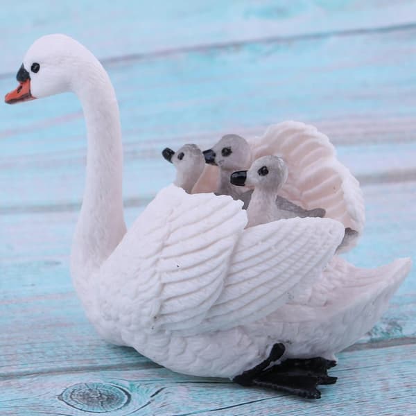 Realistic white swan with baby figurines; Animal figurines; Easter eggs; Cake