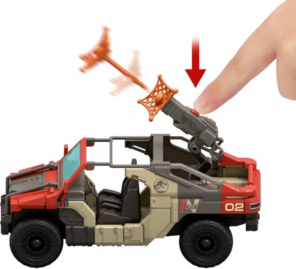 A VEHICLE WITH DINOSAUR AND HERO FIGURINES AND A PLAY LAUNCHER