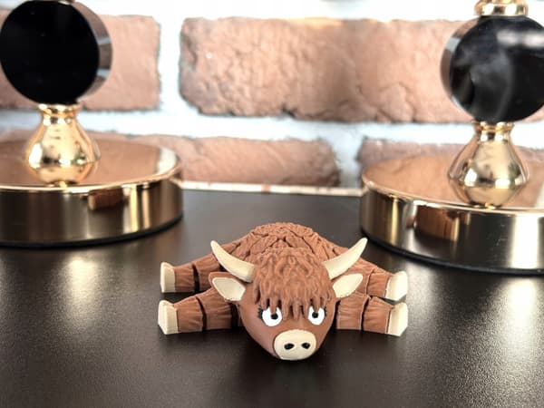 Cute segmented Fudge, 3D Mountain Cow – a charming, movable figurine