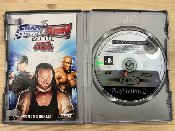 WWE SMACKDOWN VS RAW 2008 – in perfect condition – complete PS2 set