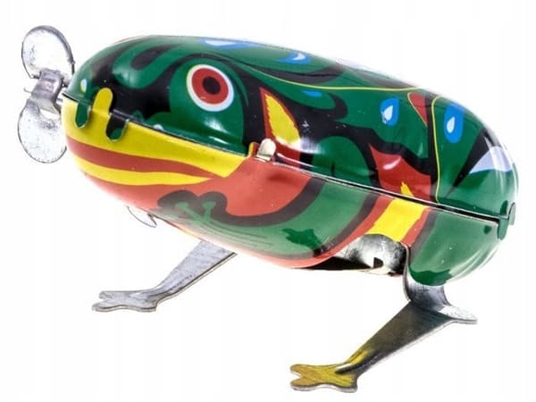 A charming vintage-style iron toy – a jumping frog