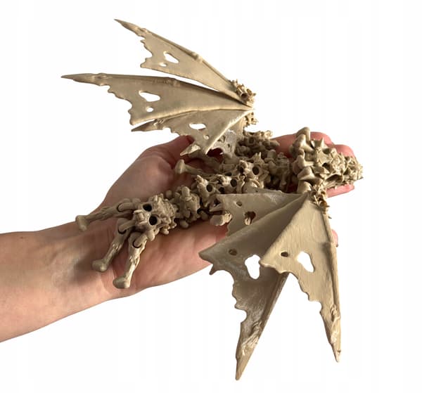 The Articulated Skeleton Dragon – a dark 3D figurine with movable wings