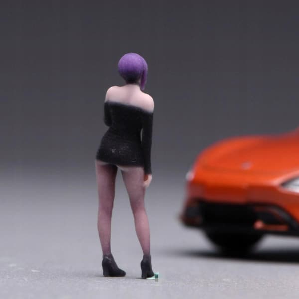 1:64 scale figure. Detailed craftsmanship. Standing female figure. Compact for