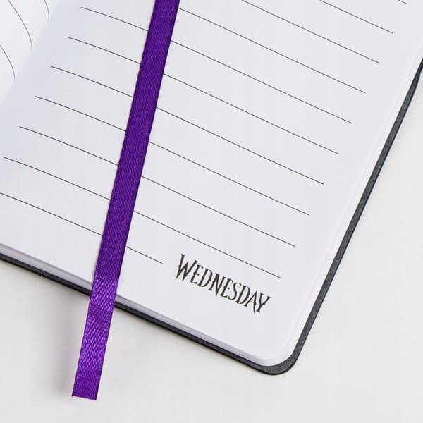 Black notebook with an elastic band, Wednesday