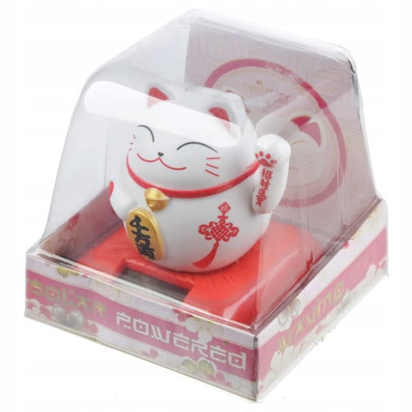 Solar-powered lucky cat figurine waving its paw