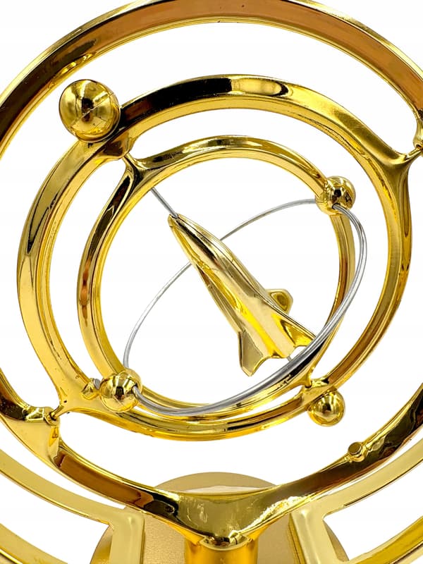 Battery-powered perpetual motion machine with a rocket – golden space rocket – space ornament