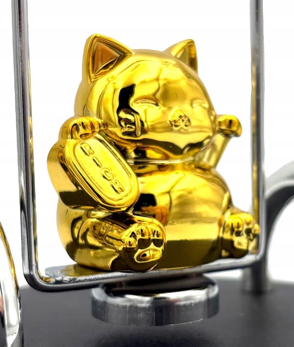 USB-powered perpetual motion toy: a magnetic swing with a kitten.