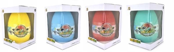 Dinosaur egg with figurines and a green mat