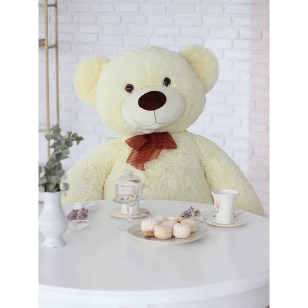 A charming, soft toy Meduolis bear in a sitting position, 78 cm