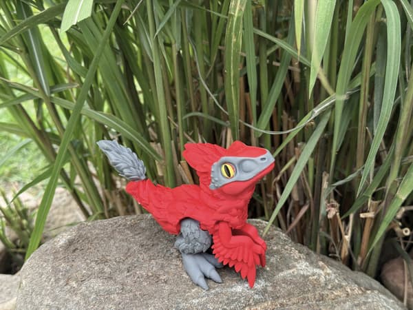 Pyroraptor dinosaur 3D moving figurine inspired by the feathered predator