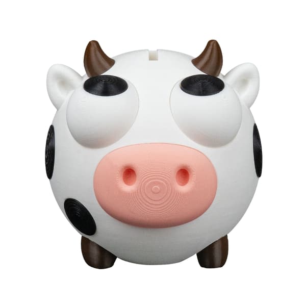 Ko-møntpenge | Sød plastik sparegris
