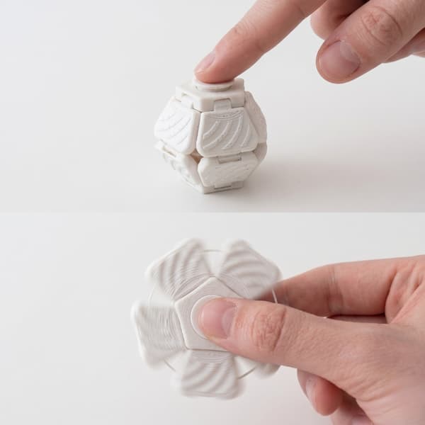 PentaSpin 2-i-1 Fidget Spinner & Taktil Klicker Stresslindring