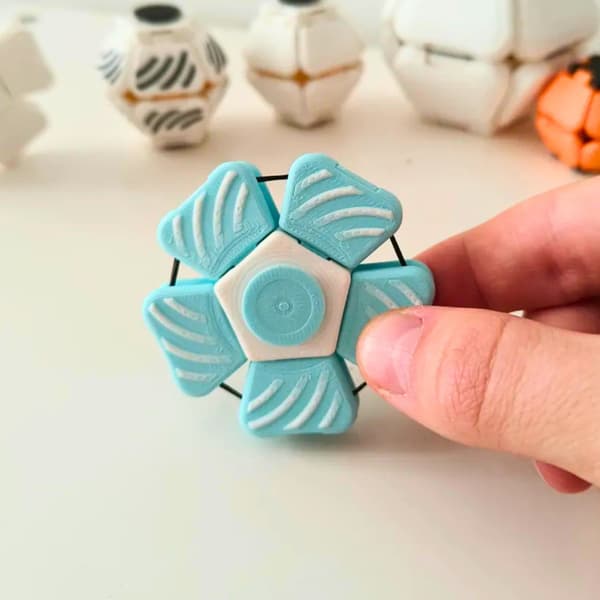 PentaSpin 2-i-1 Fidget Spinner & Taktil Klicker Stresslindring